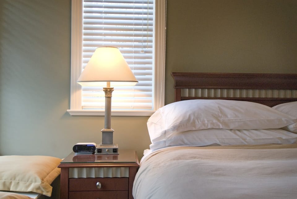 Junior Suite king bed with headboard