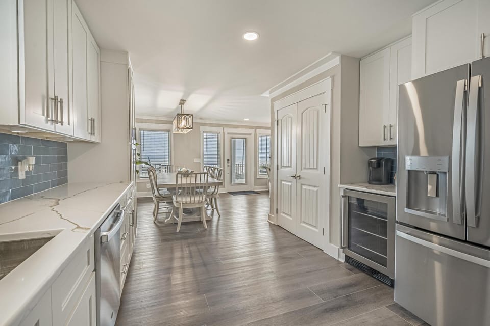 Bright, modern kitchen and dining area with sleek finishes