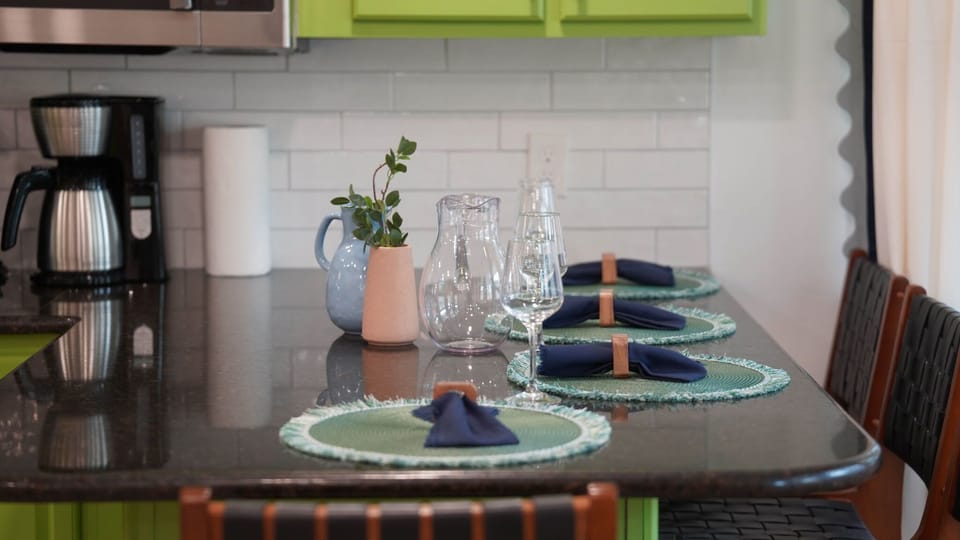 Good food tastes better when shared. Whether you're cooking up a masterpiece or unboxing your favorite local takeout, this dining table is where memories are plated and passed around.