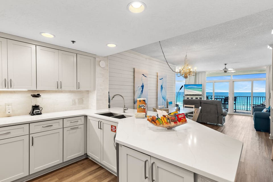 Cook meals in your fully stocked and Remodeled kitchen with Gulf Views - Welcome to your home away from home at Jade East 420!