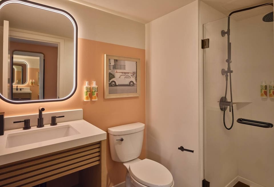 Get ready with bright vanity lighting and modern, spotless finishes.