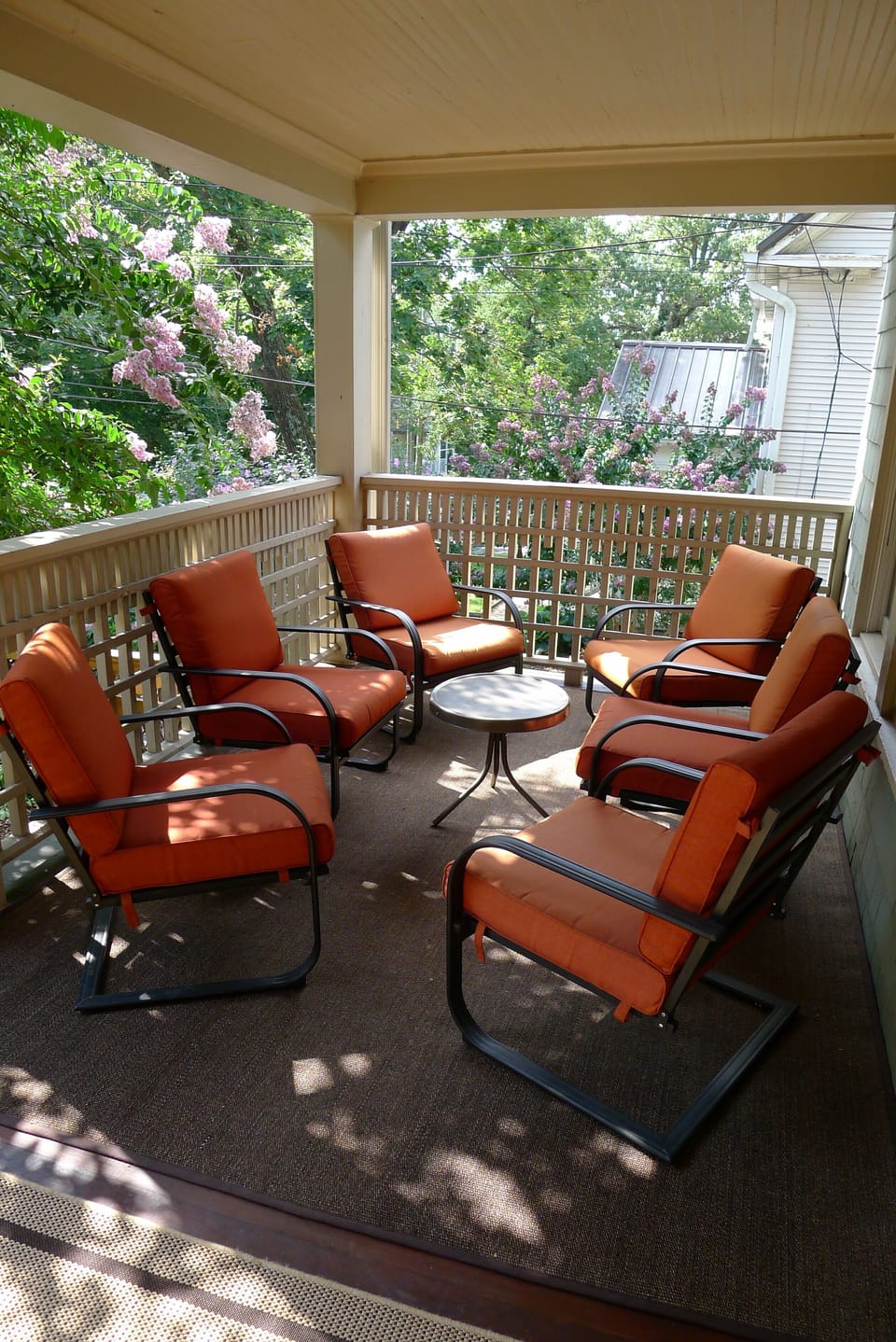 Large shaded front porch with plenty of seating