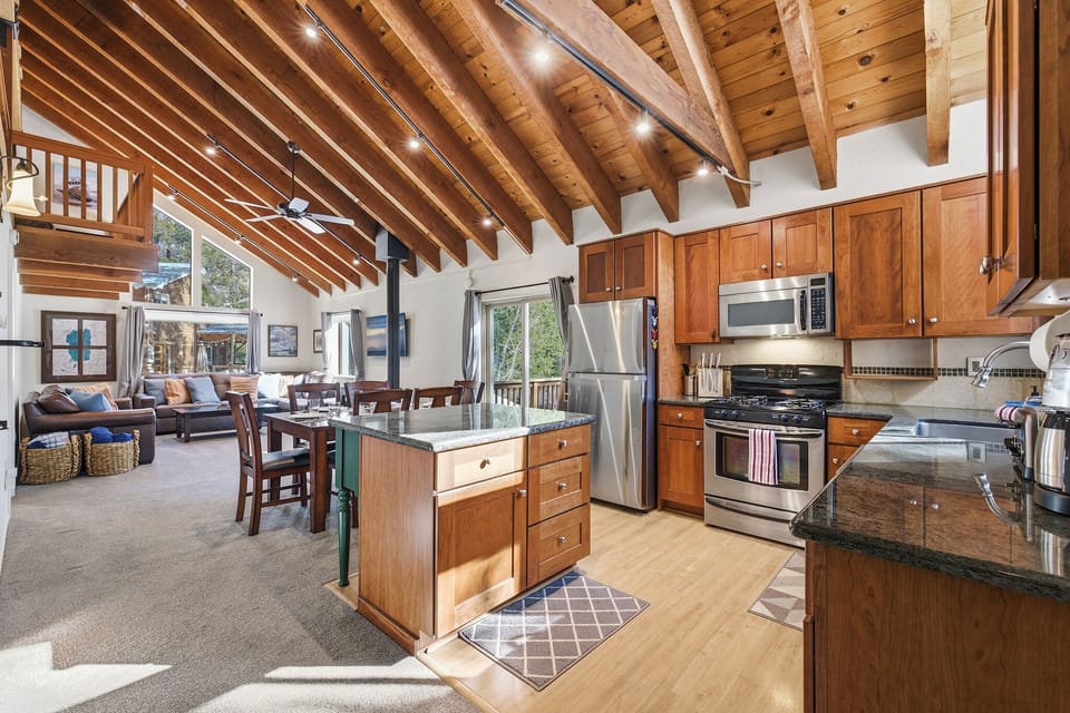 Open-concept kitchen and living area—perfect for meals and movie nights.