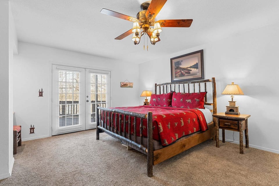Bedroom 1- Main Floor- King Bed, Satellite TV, Attached Bath, Main Level Deck Access
