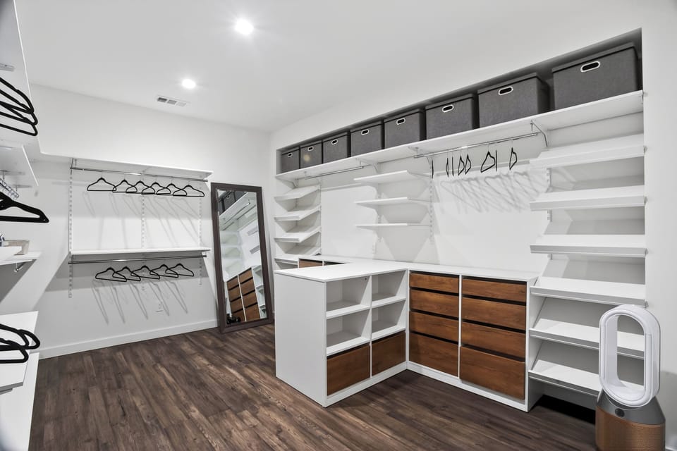 Primary bedroom's walk-in closet.