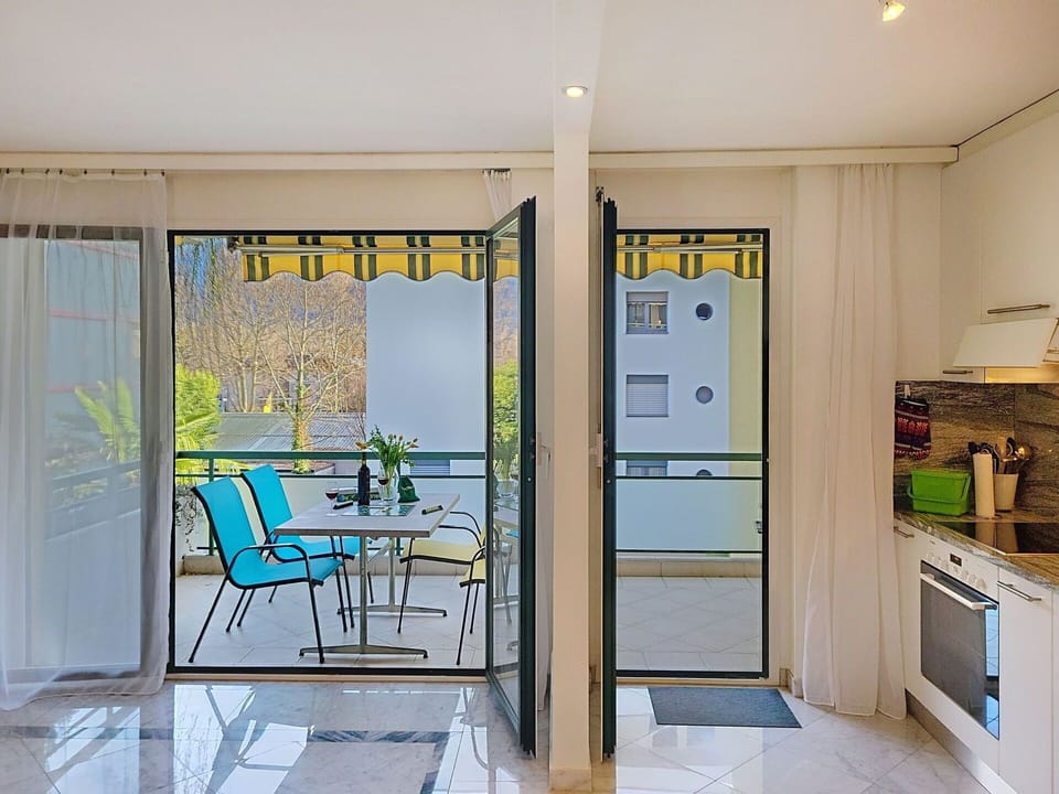 Furniture, Interior Design, Flooring, Table, Floor, Chair, Kitchen & Dining Room Table, Lighting, Door, Dining Room