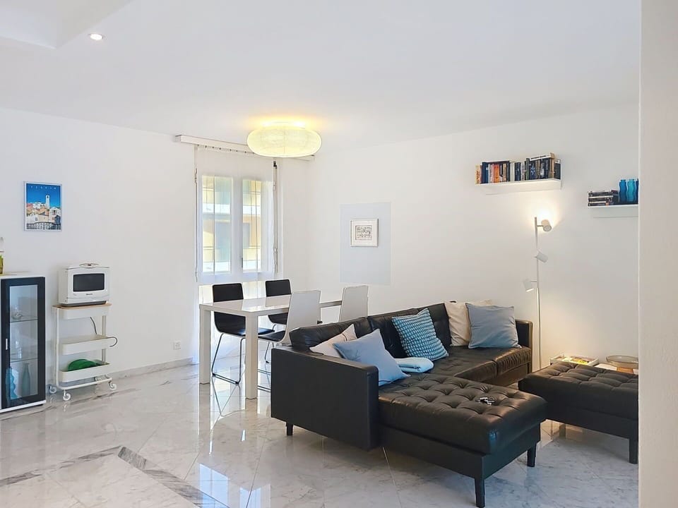 Furniture, Interior Design, Flooring, Couch, Floor, Living Room, Table, Ceiling, Room, Home