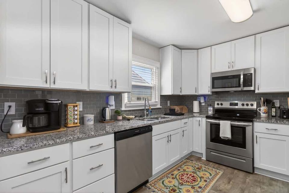 Another view of the kitchen showing layout and storage options.