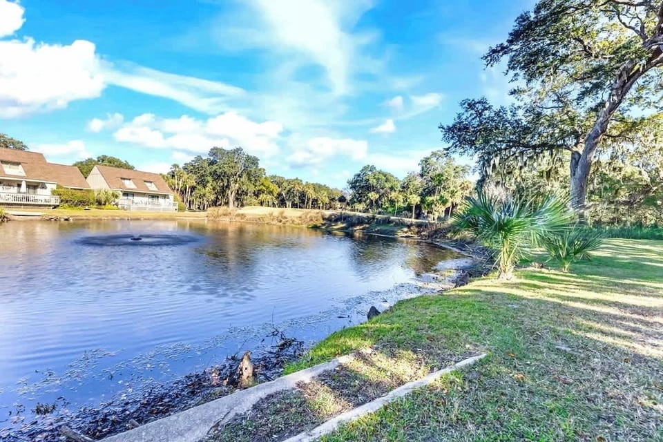 Waterfront property with serene lagoon views, lush landscaping, and peaceful natural surroundings for a tranquil getaway.