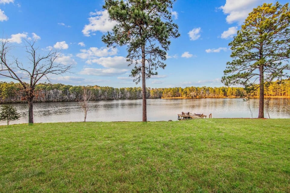 Wide open lawn, private dock, and uninterrupted lake views, this is what seclusion looks like.