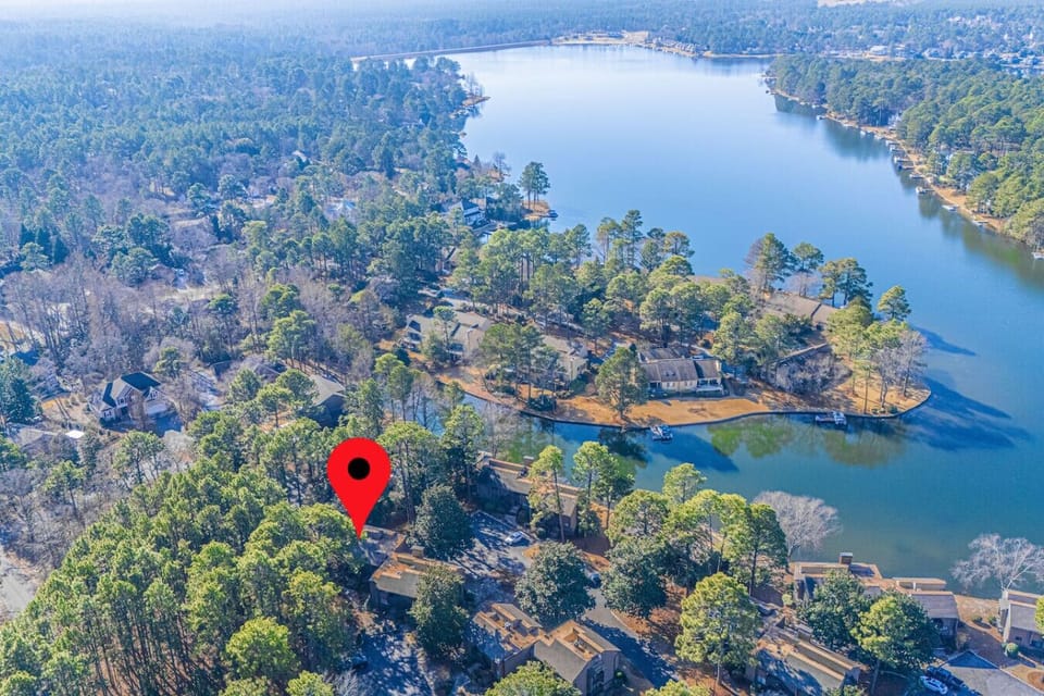 Overhead view of the building in relation to the lake. Guests enjoy walking the neighborhood.
