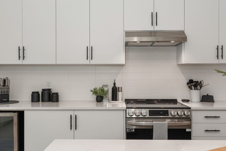 Prepare meals with ease in a modern kitchen equipped with all the essentials and appliances.