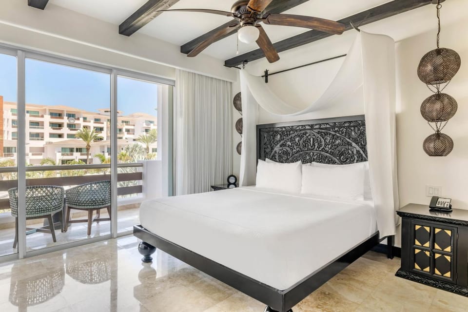 Wake up to sunlit comfort and step onto your balcony.