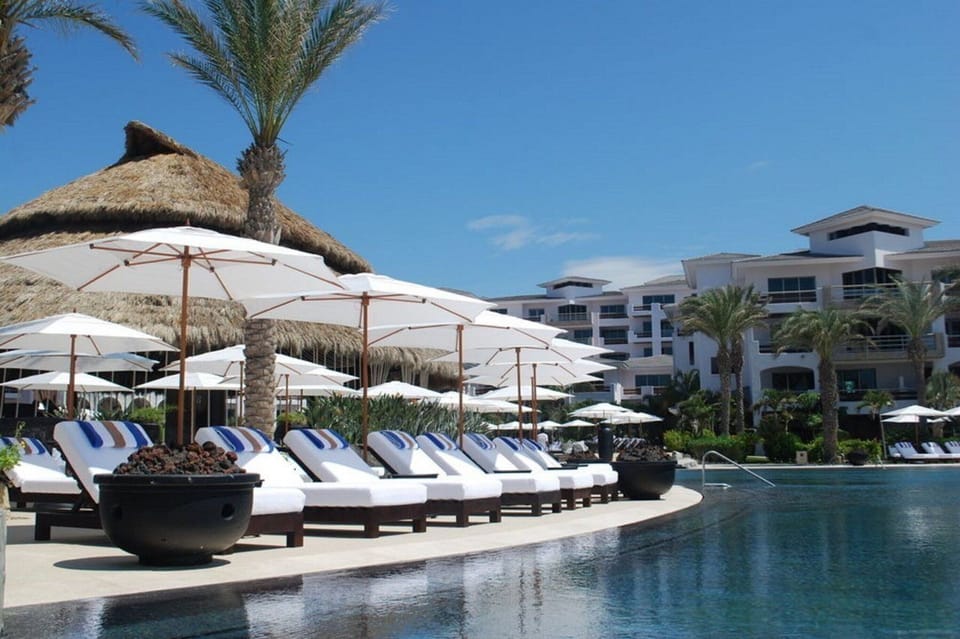 Stretch out on plush loungers and enjoy attentive pool service.