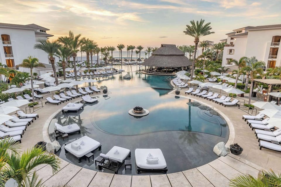 Soak up sunset serenity over the lagoon pool and ocean beyond.