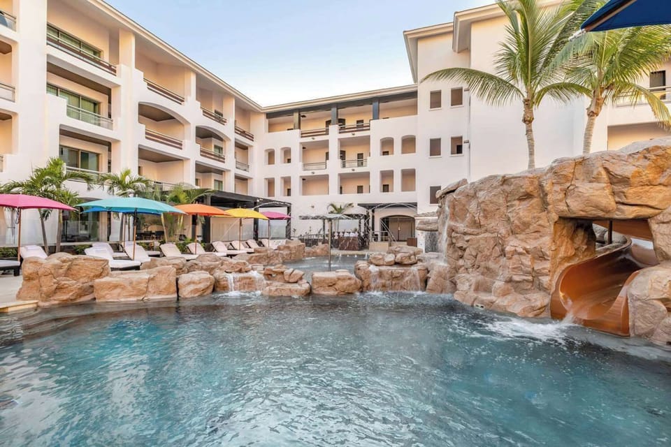 Splash into fun with the waterslide and sunny shallow pool.
