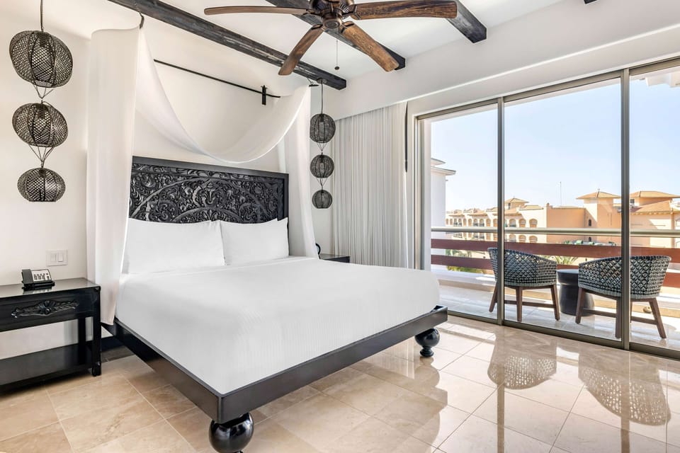 Drift off under a romantic canopy in cool, quiet comfort.