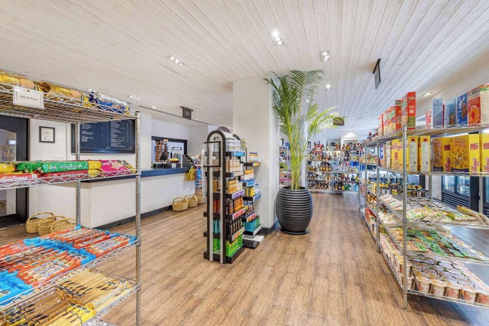 Grab quick snacks and essentials anytime at the on-site market.