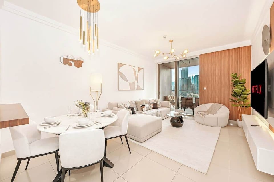 Bright and spacious living area with comfortable seating and plenty of natural light