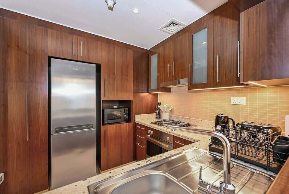 Kitchen has all the essentials you need including pots, pans, cooking utensils, appliances