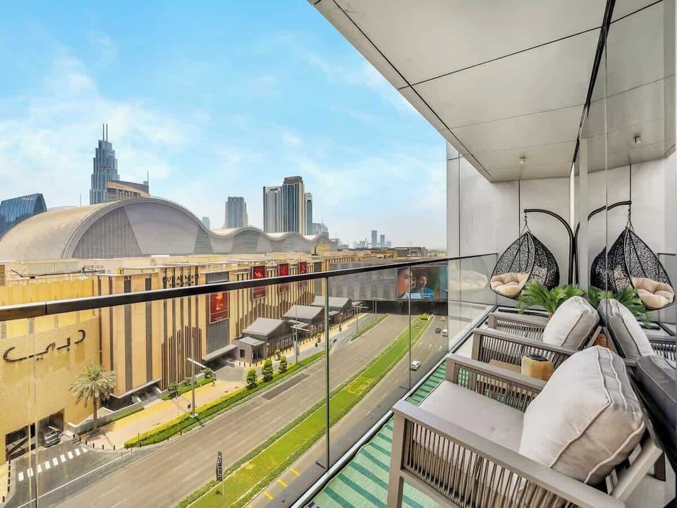 Start your morning with unobstructed views of the Burj Khalifa and Dubai Mall. This spacious balcony features a double egg chair and two comfortable seats perfect for coffee, conversation, or simply soaking in the energy of Downtown Dubai.