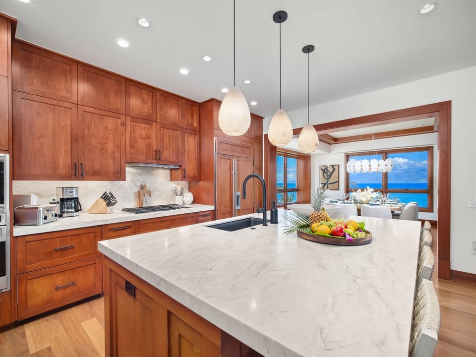 Gourmet Kitchen with Seating | Convenient to Dining and Living Areas