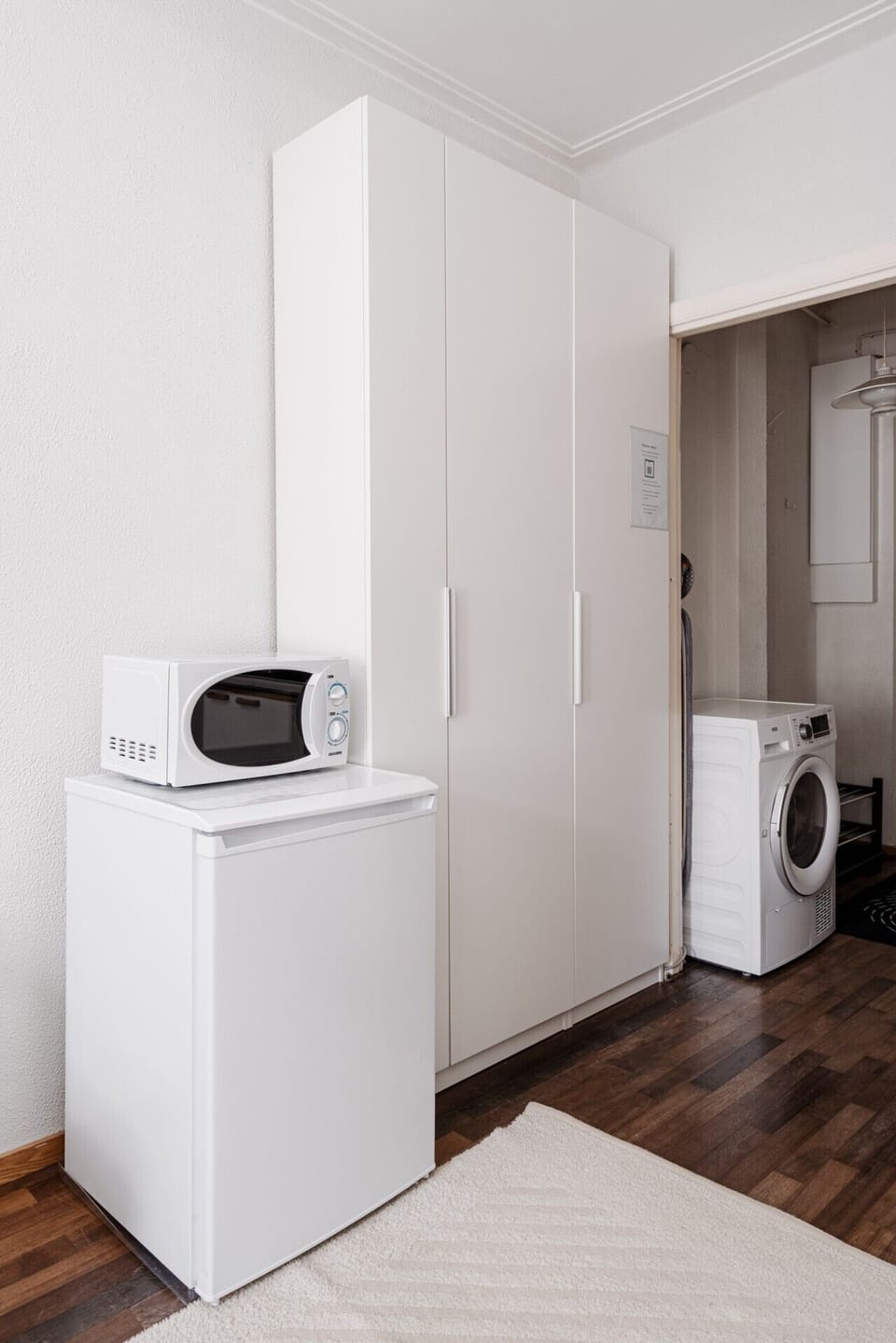 Stay organized during your trip with ample closet space and modern amenities like a microwave and a small fridge.