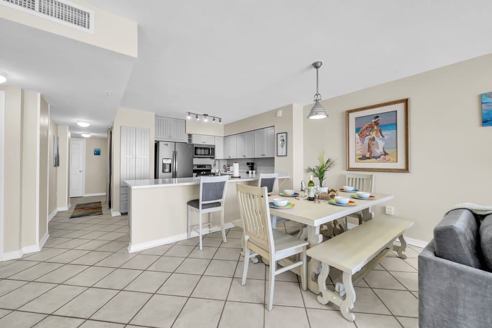 Your spacious open-concept common areas seamlessly from kitchen to dining, creating the perfect space for family meals and relaxation.
