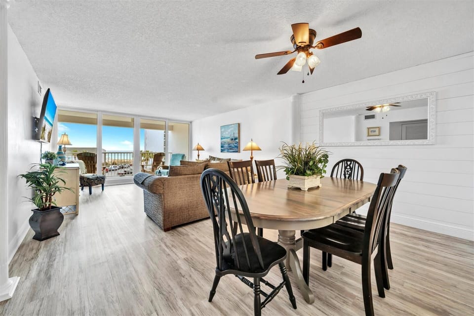 Your bright, open-concept living space flows seamlessly to an oceanfront balcony where you'll savor meals with stunning water views.