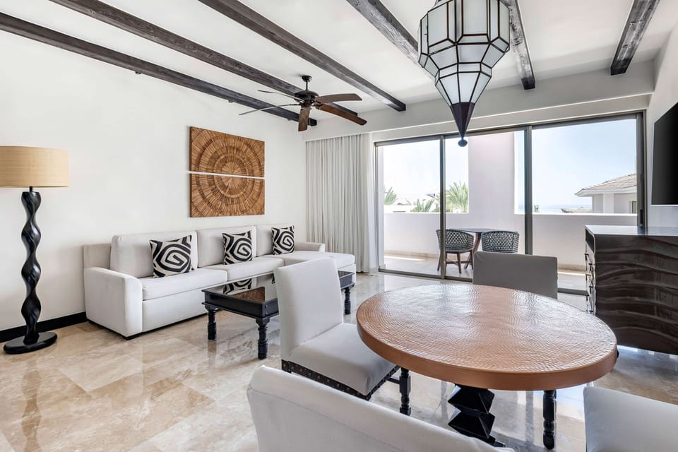 Gather for drinks in a sunlit lounge with style.