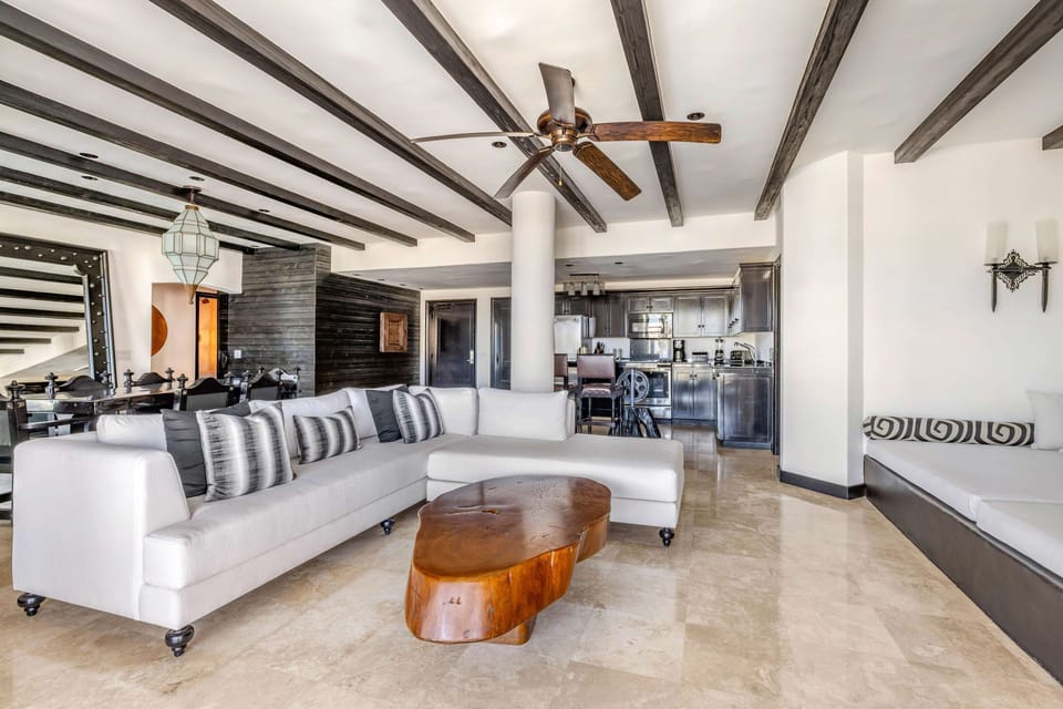 Gather for easy conversation in a stylish open-concept living space.