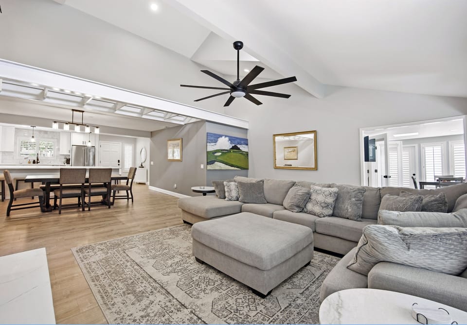 Living & Dining area - comfortable with large TV, fireplace and bar