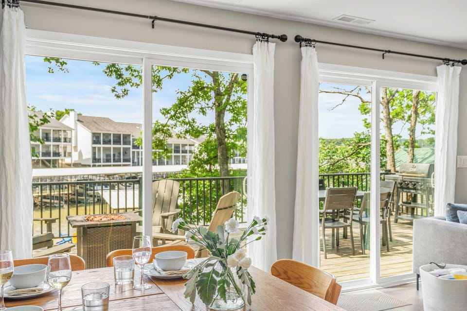 The lower floor offers views of the water from every window. - The Solstice - Lake Ozark, MO