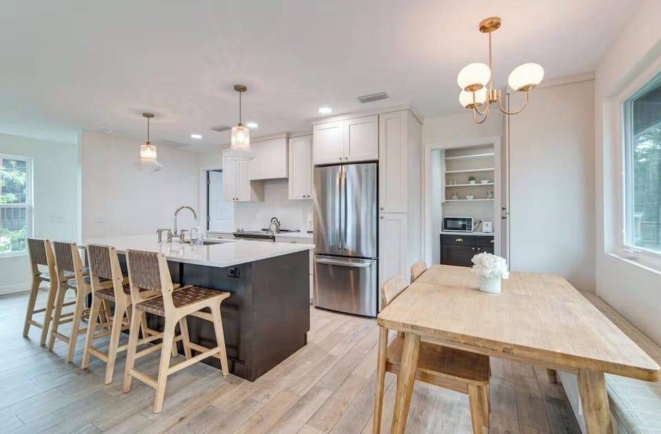 2nd floor kitchen and dining table seating.