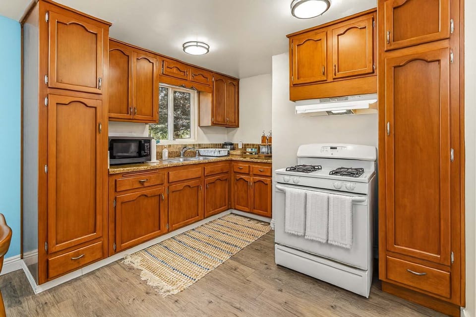 Kitchen with modern appliances and ample space.