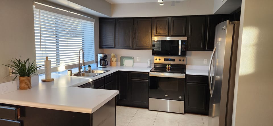 microwave, indoor, coffee and or coffee, kitchen, oven, refrigerator, stove