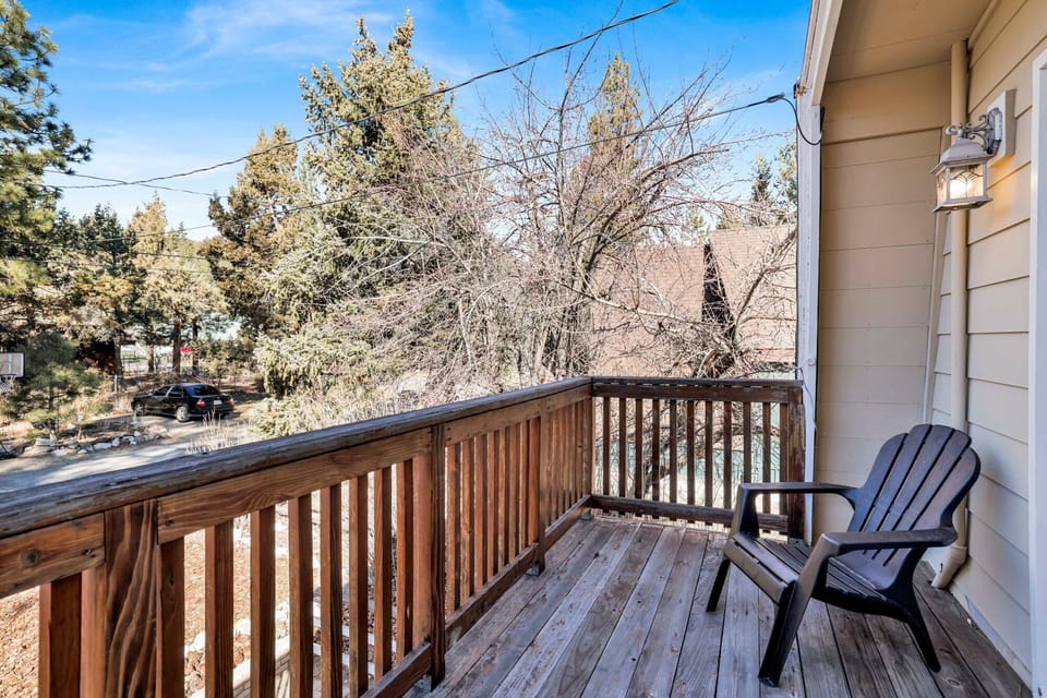 Private outdoor hot tub, surrounded by tall pines, perfect for relaxing under the trees after a day of adventure—enjoy peaceful forest views, fresh air, and a truly rejuvenating stay.