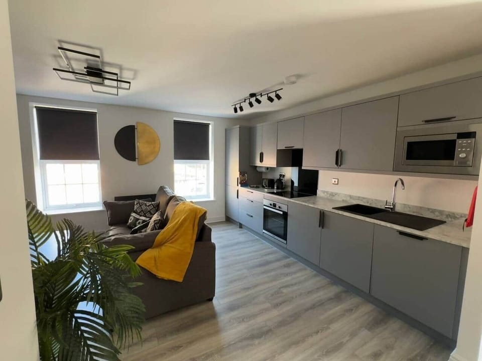 Modern and Stylish, newly renovated living space with comfortable seating, smart TV and fully equipped kitchen. Pictures of local area and points of interest are presented throughout. 