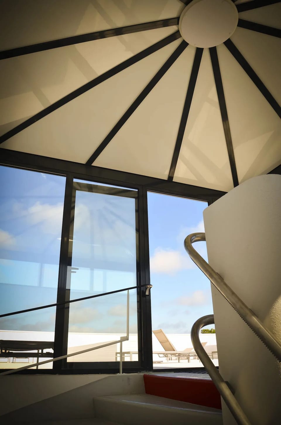 Step upstairs and feel sunlight spill into your getaway.