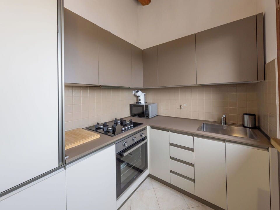 Kitchen, Kitchen Appliance, Countertop, Major Appliance, Cabinetry, Interior Design, Wood, Flooring, Home Appliance, Kitchen Stove