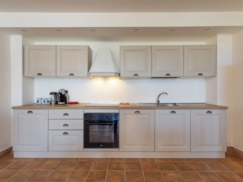 Kitchen, Cabinetry, Countertop, Kitchen Appliance, Flooring, Interior Design, Wood, Major Appliance, Furniture, Floor