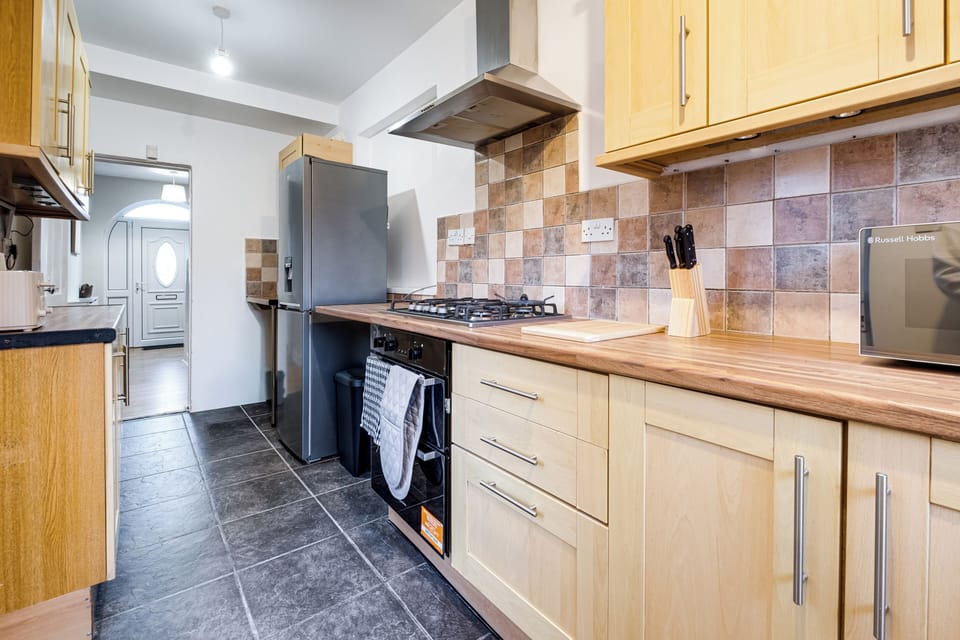 Equipped kitchen - New fridge freezer. 
Electric cooker, stove, small appliances