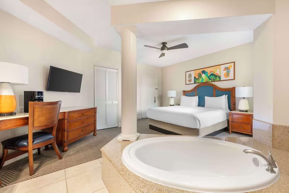 Soak in the spacious open-plan suite after a full day out.