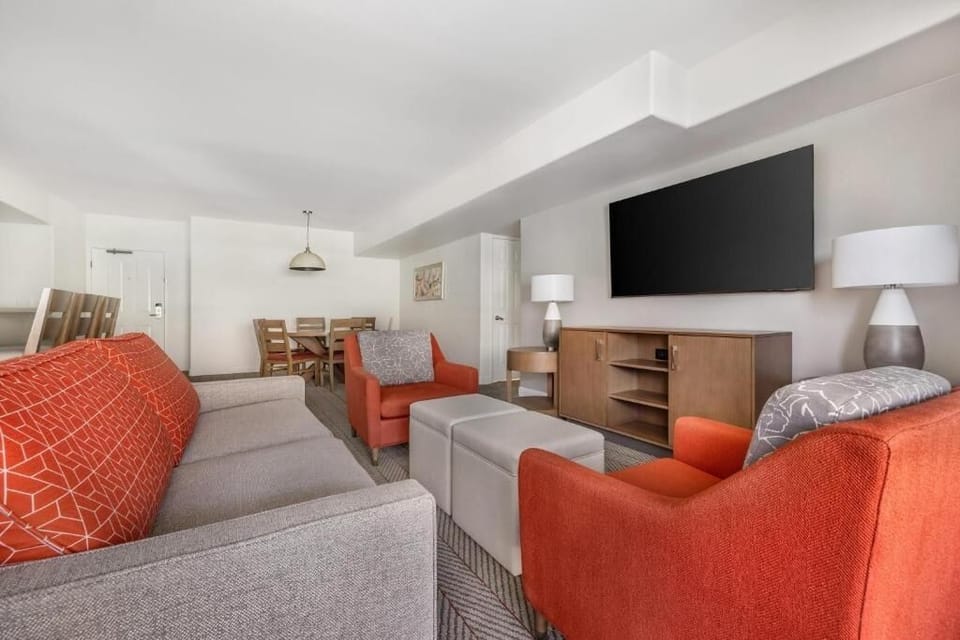 Relax together in the open living space with dining nook.
