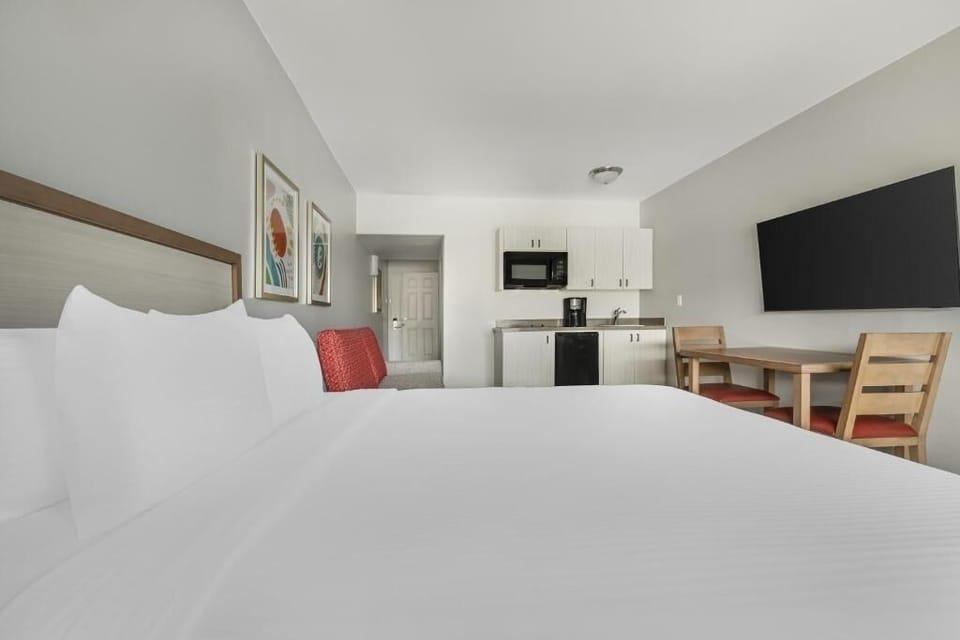 Wake up to a roomy suite with convenient in-room dining.