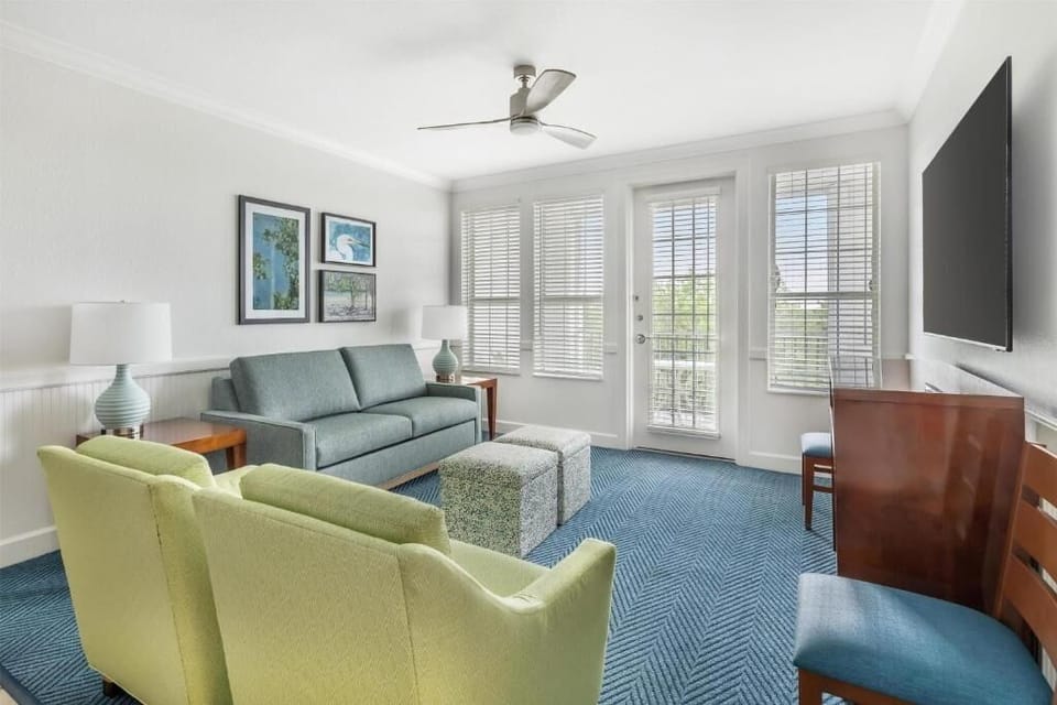 Lounge comfortably with open space flowing to the kitchen area.