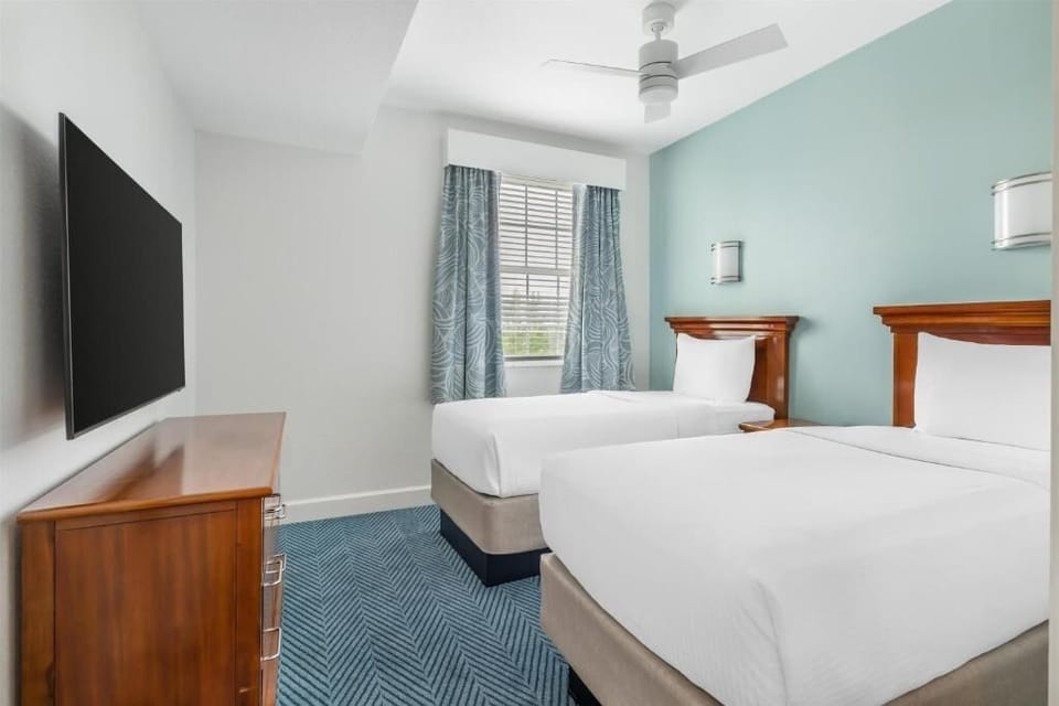 Settle into twin beds for easy, comfortable nights together.