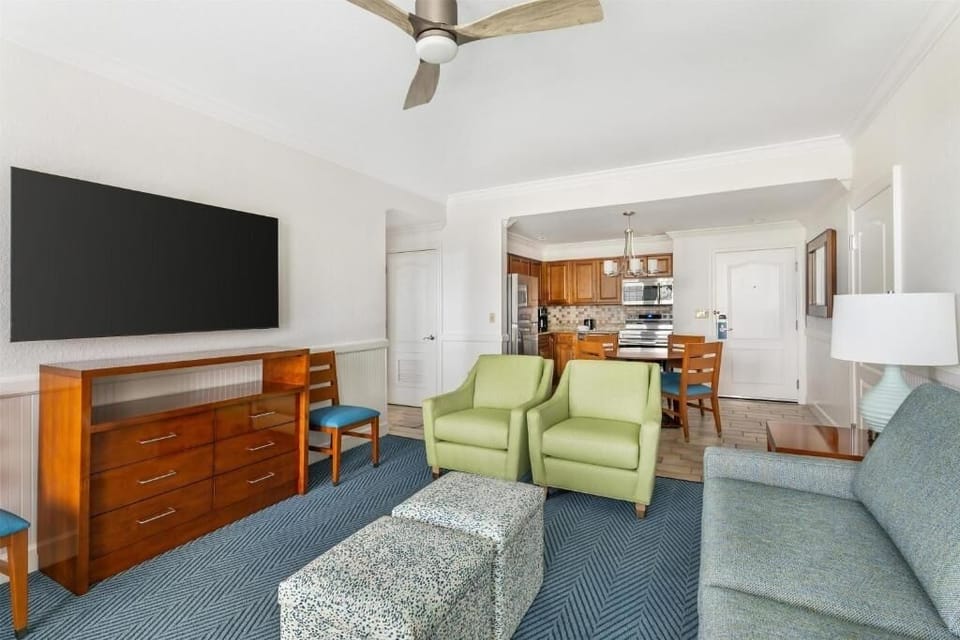 Gather for movie nights with spacious seating and oversized TV.
