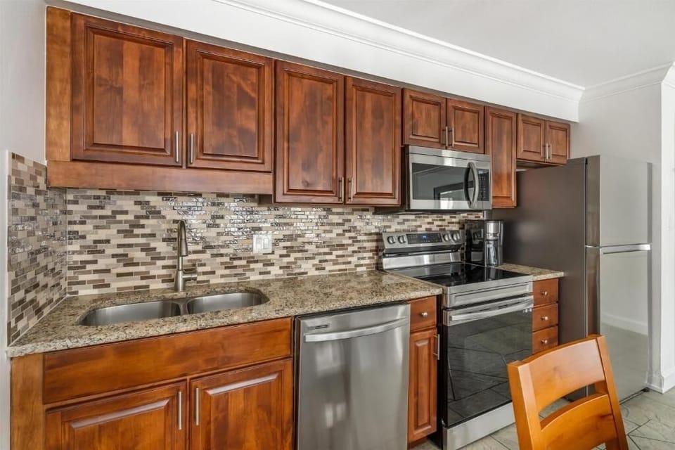 Cook with ease using stainless appliances and generous counters.