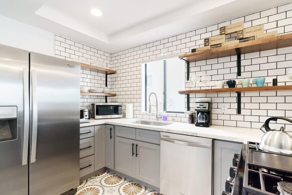 Open, full kitchen with high end appliances